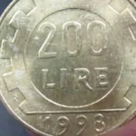 Moneta da 200 lire del Mondiale 1990 con la scritta "Campione", simbolo di valore collezionistico.